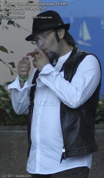 Михаил Козырев с сигарой - фото